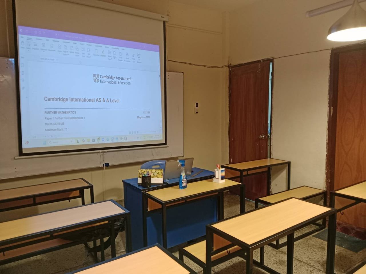 Cambridge International AS & A Level lesson displayed on screen at IgnitED Faculty Corner, Lalmatia, Dhaka